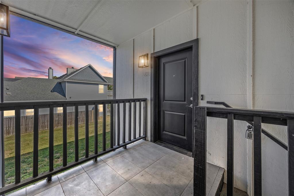 201 East 5th Street, Unit 201 Ferris, TX 75125 - Photo 7 of 19 a view of a balcony