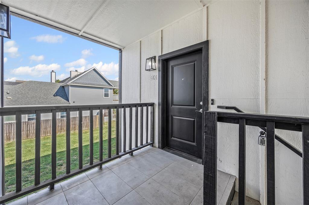 201 East 5th Street, Unit 201 Ferris, TX 75125 - Photo 9 of 19 a view of a balcony