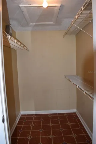 a view of a room with racks on the wall