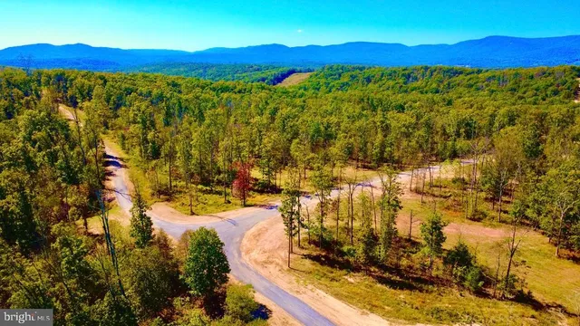 a view of an outdoor space and mountain view