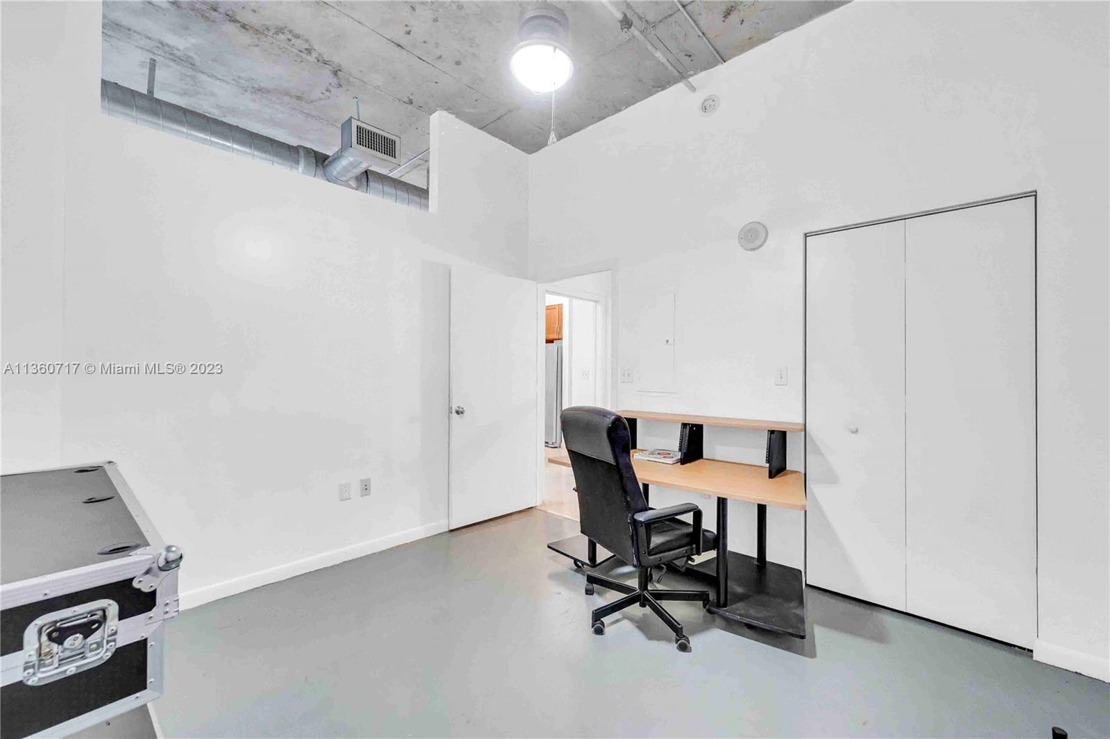 2001 Biscayne Boulevard, Unit 3207 Miami, FL 33137 - Photo 12 of 15 a view of a workspace with furniture