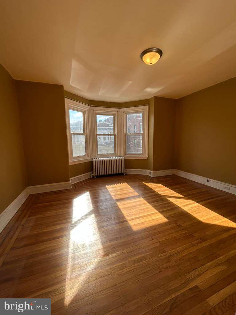 4747 Sansom Street Philadelphia, PA 19139 - Photo 17 of 21 a view of empty room with window