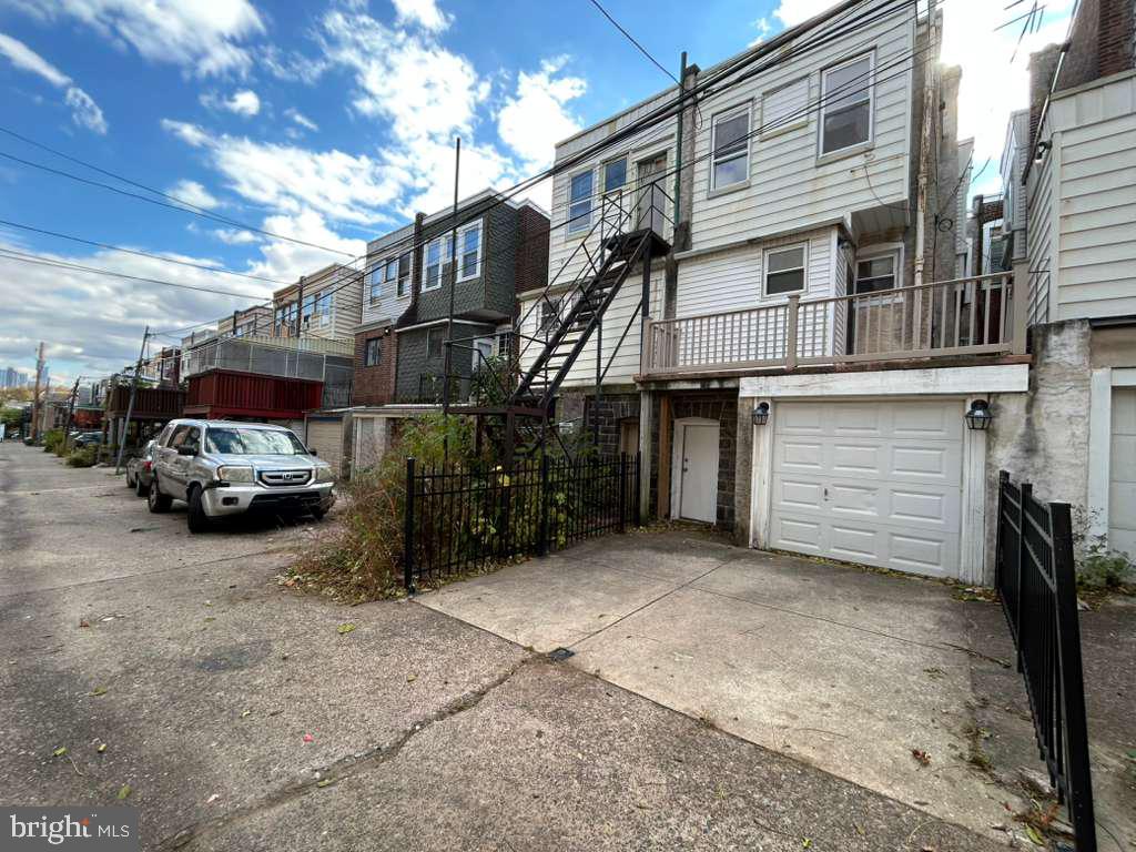 4747 Sansom Street Philadelphia, PA 19139 - Photo 20 of 21 a view of a car park in front of house