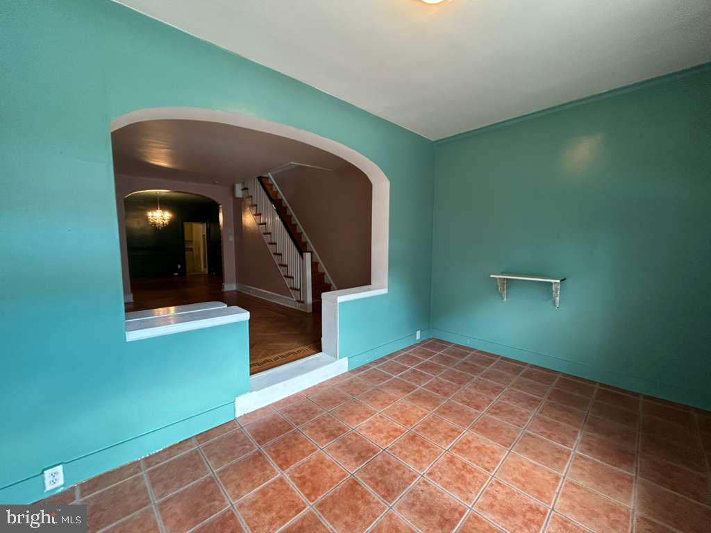 4747 Sansom Street Philadelphia, PA 19139 - Photo 3 of 21 a front view of a house with a yard