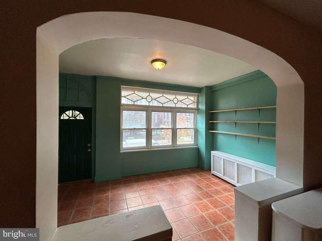 4747 Sansom Street Philadelphia, PA 19139 - Photo 4 of 21 a view of an empty room with a window