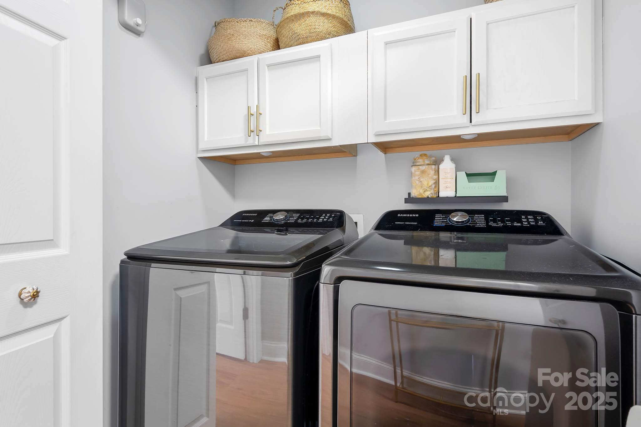 135 High Ridge Road Mooresville, NC 28117 - Photo 19 of 24 a kitchen with stainless steel appliances granite countertop a stove and a white cabinets
