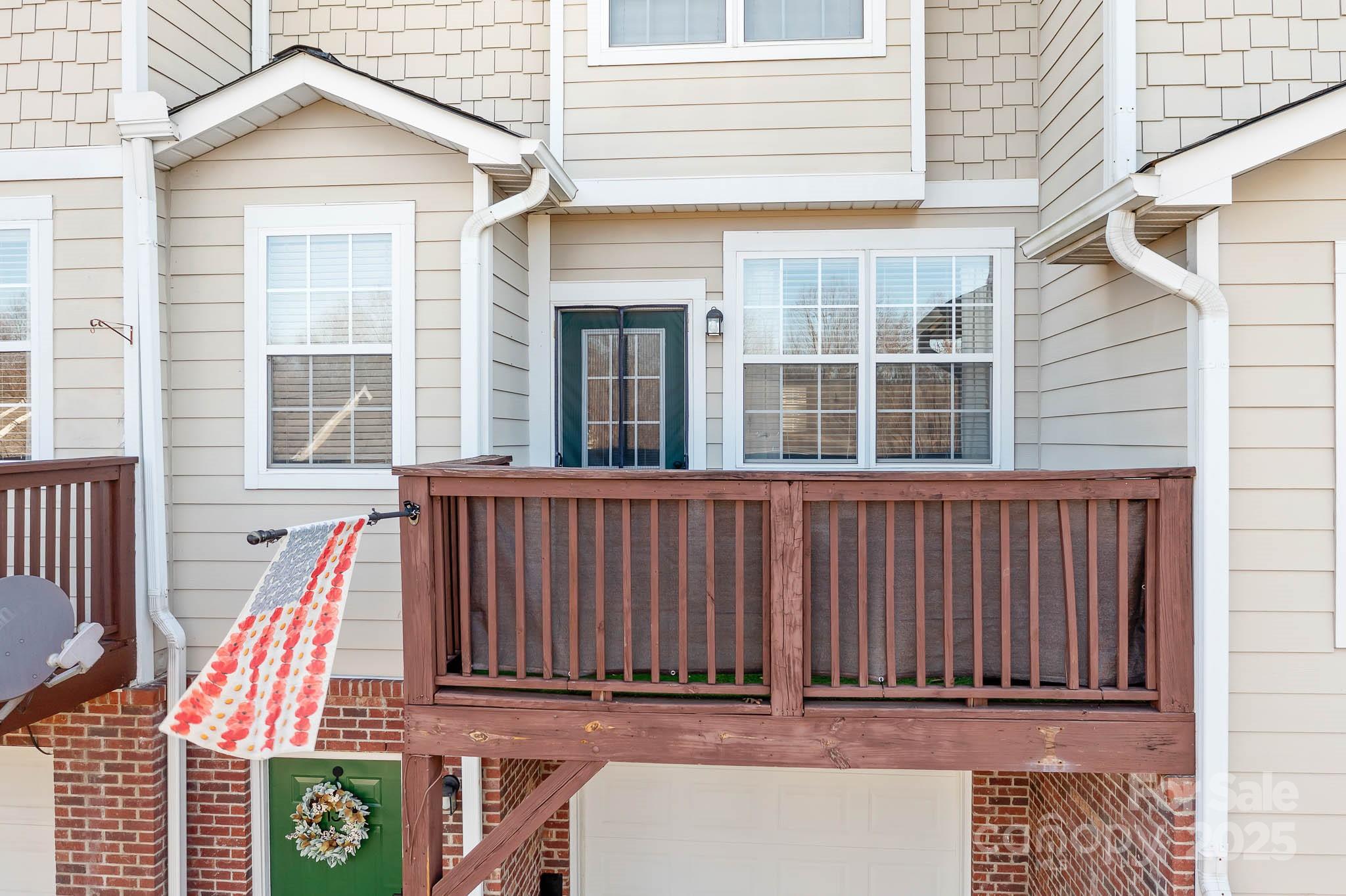 135 High Ridge Road Mooresville, NC 28117 - Photo 20 of 24 a view of a house with a door