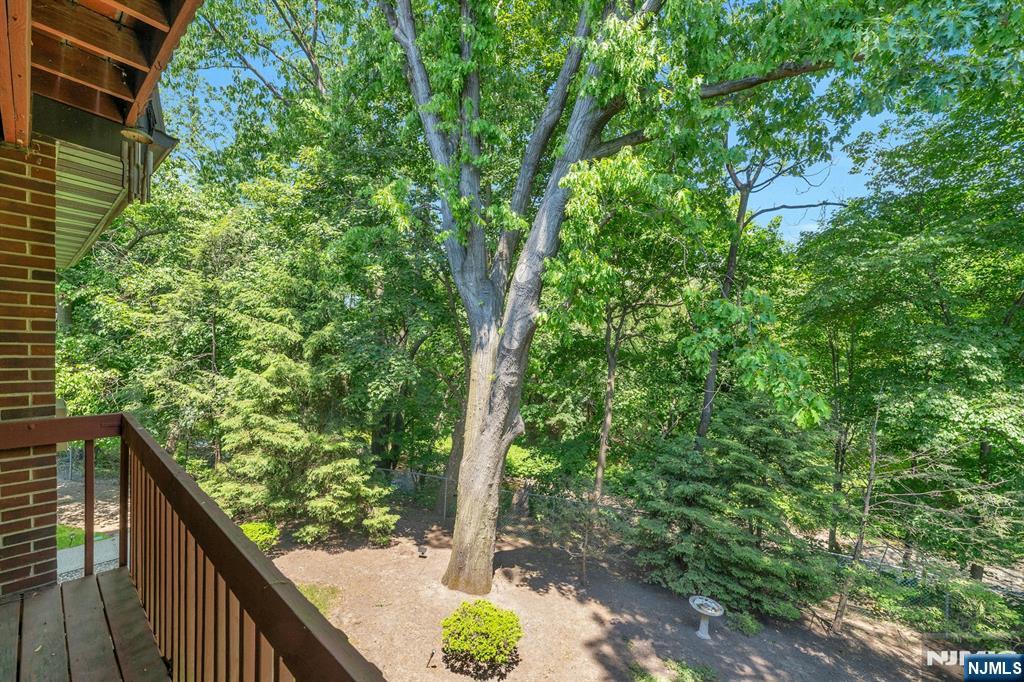 666 Mill Street, Unit C6 Belleville, NJ 07109 - Photo 21 of 25 a view of a garden from a balcony