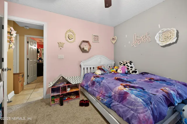 a bed room with a bed and a table