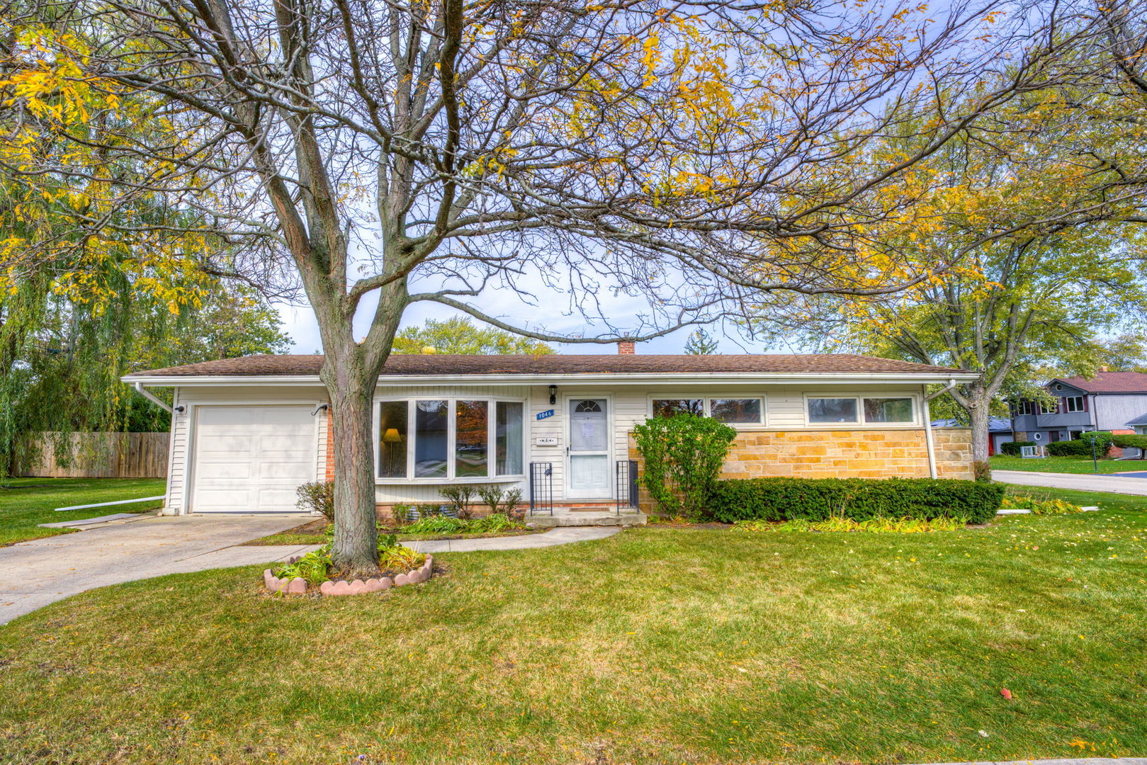 1046 Midway Road Northbrook, IL 60062 - Photo 1 of 24 front view of a house with a yard