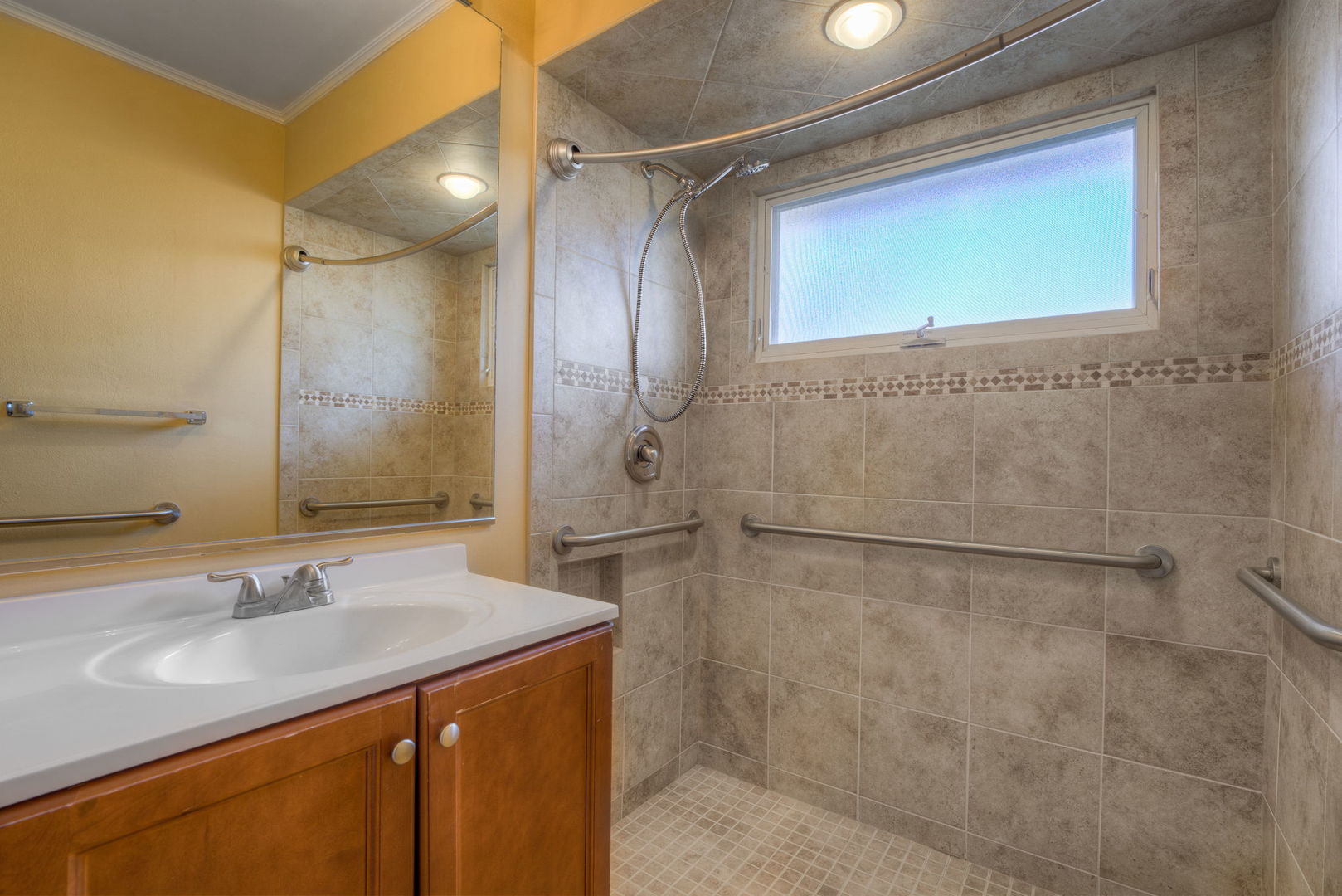 1046 Midway Road Northbrook, IL 60062 - Photo 13 of 24 a bathroom with a granite countertop shower sink and mirror