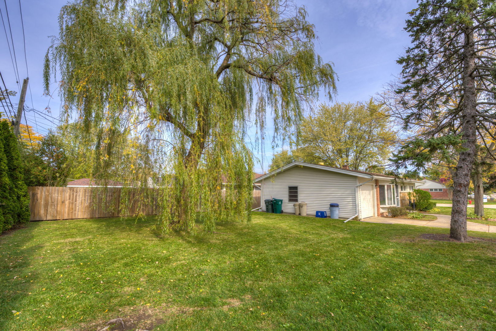 1046 Midway Road Northbrook, IL 60062 - Photo 22 of 24 a house view with swimming pool in front of it