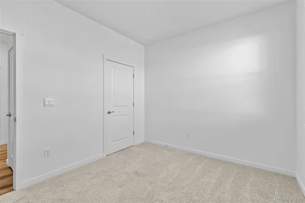 a bathroom with a sink toilet a mirror and shower