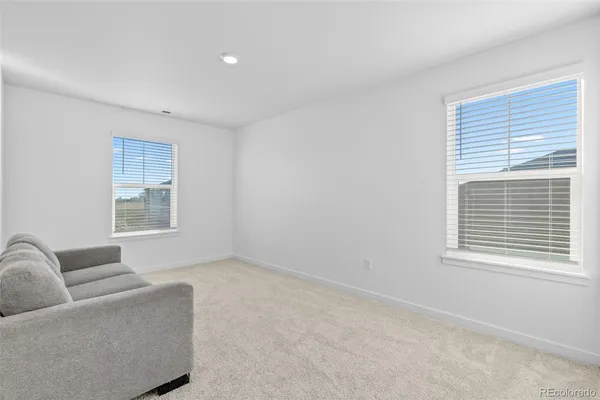 a view of an empty room and window
