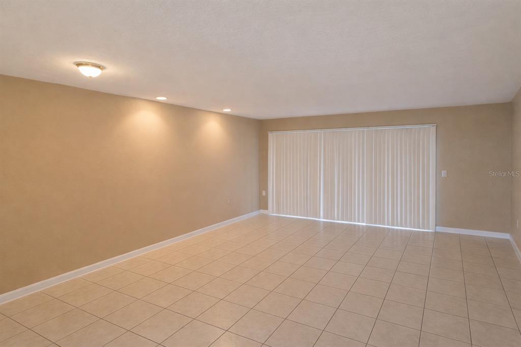 2727 West Oak Ridge Road, Unit 2/ BLDG #7 Orlando, FL 32809 - Photo 2 of 13 a view of an empty room