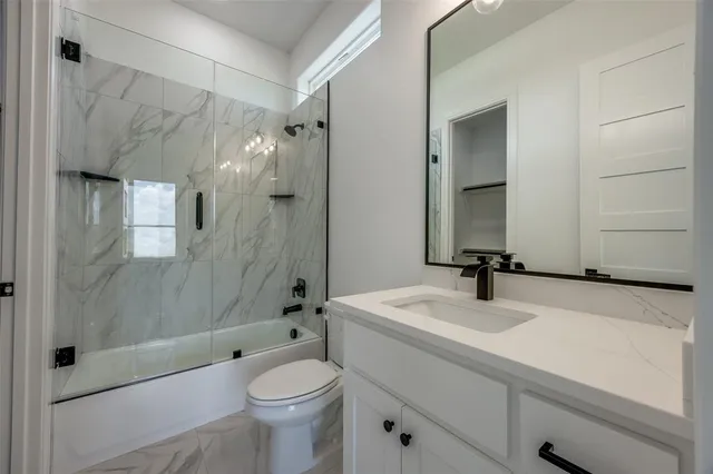 a living room with furniture a window and a fireplace