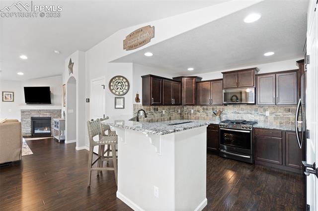 11467 Rill Point Colorado Springs, CO 80921 - Photo 8 of 40 Breakfast bar for everyday use