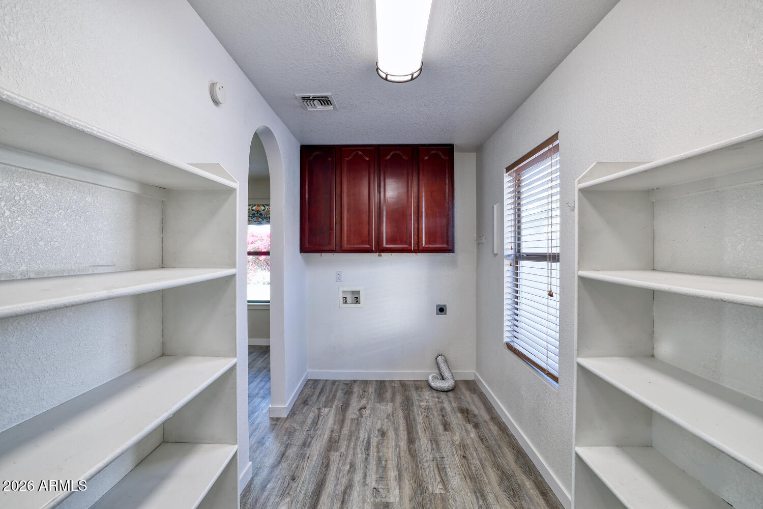 3940 South Moccasin Trail Gilbert, AZ 85297 - Photo 16 of 45 Pantry and Laundry