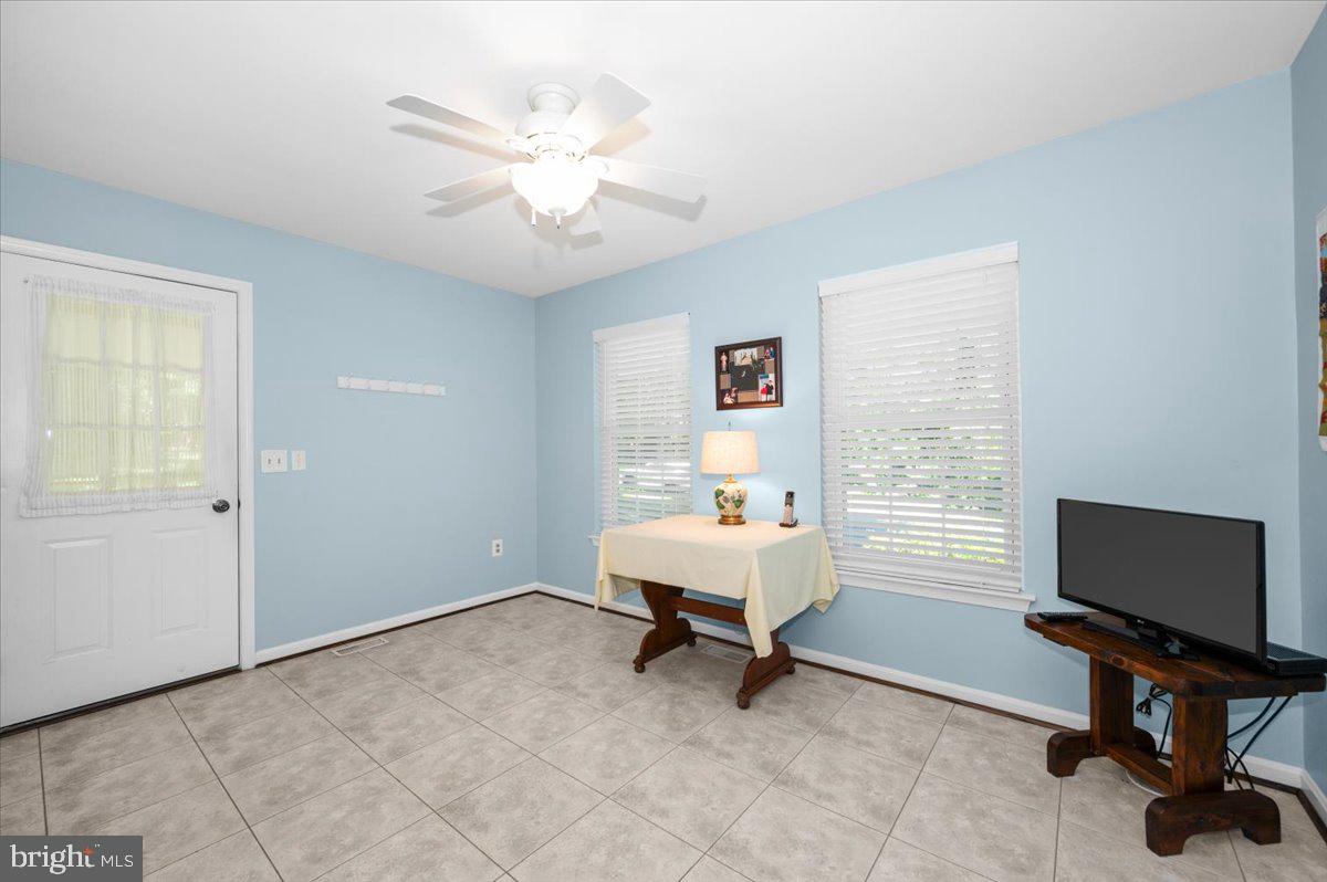 2614 Apple Way Dunkirk, MD 20754 - Photo 16 of 54 a view of a workspace with furniture and a window