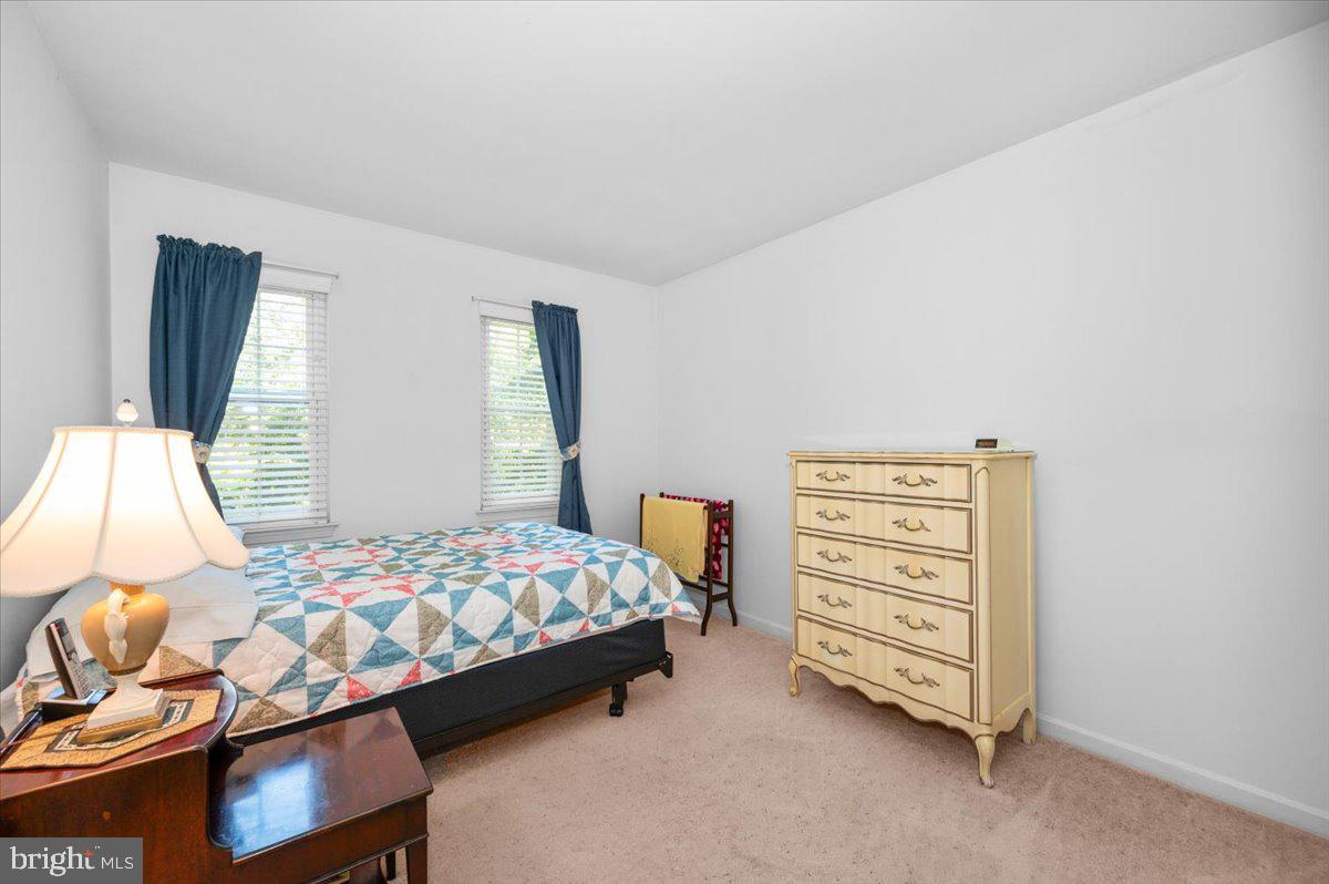 2614 Apple Way Dunkirk, MD 20754 - Photo 25 of 54 a bedroom with a bed and a window