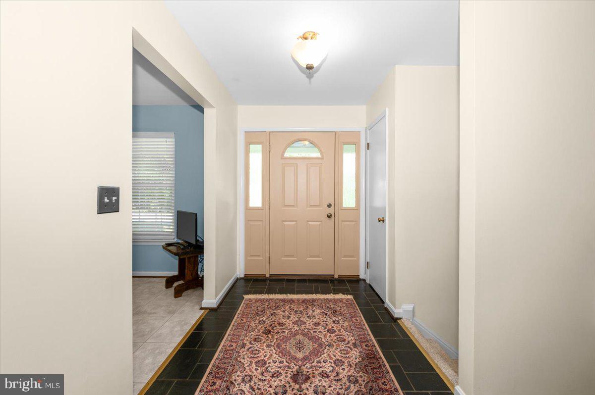 2614 Apple Way Dunkirk, MD 20754 - Photo 3 of 54 a bathroom with a sink and a mirror