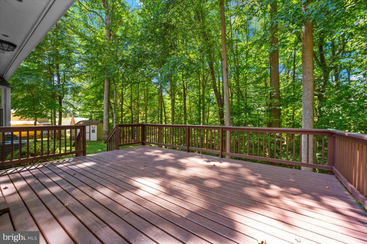 2614 Apple Way Dunkirk, MD 20754 - Photo 40 of 54 a view of a wooden deck with a yard