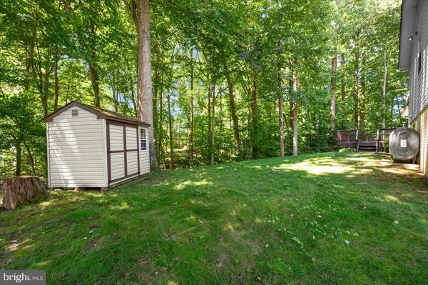 a view of a deck with a fence