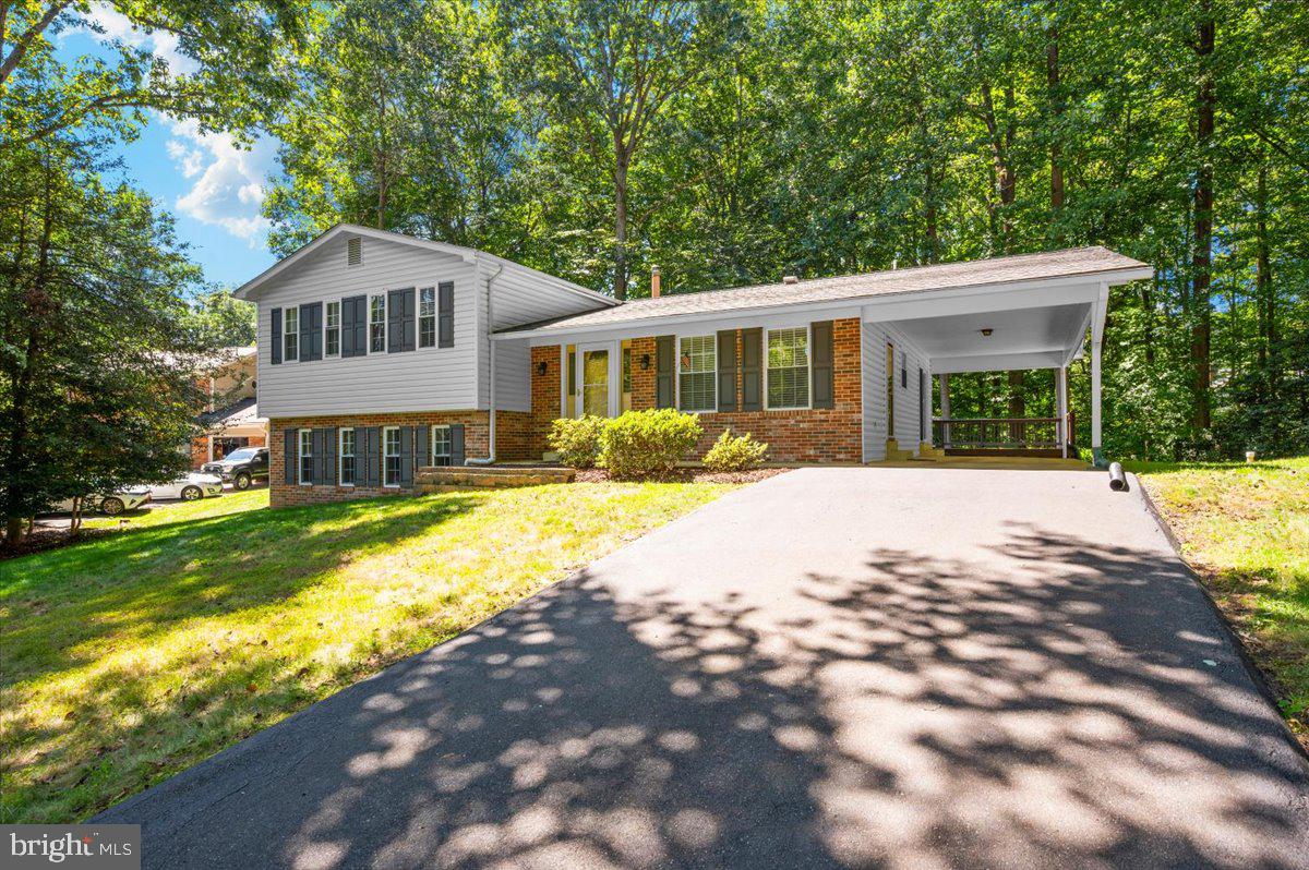 2614 Apple Way Dunkirk, MD 20754 - Photo 54 of 54 a front view of a house with a yard and trees