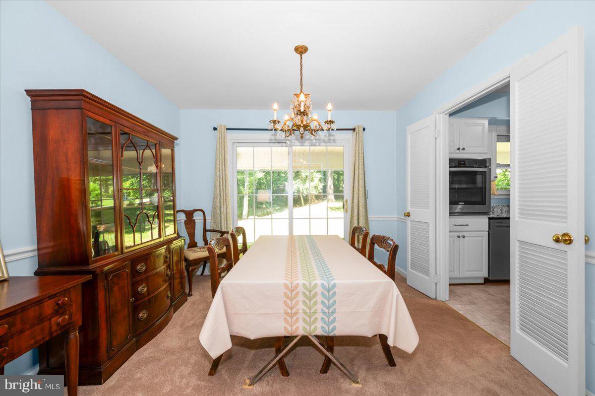 2614 Apple Way Dunkirk, MD 20754 - Photo 7 of 54 a view of a dining room with furniture window and outside view