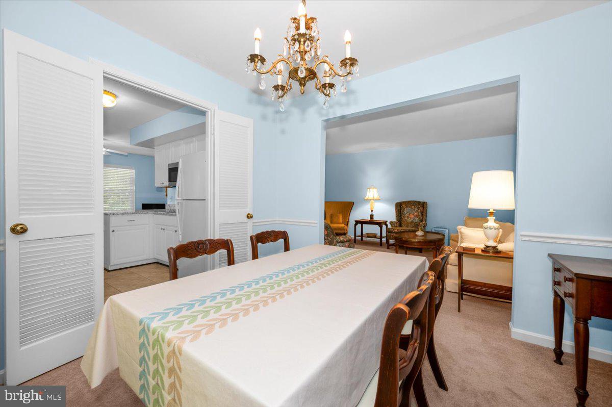 2614 Apple Way Dunkirk, MD 20754 - Photo 8 of 54 a very nice looking dining room with a table and chairs