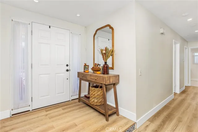 a bedroom with a bed and a desk