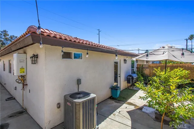 an aerial view of residential house with an outdoor space