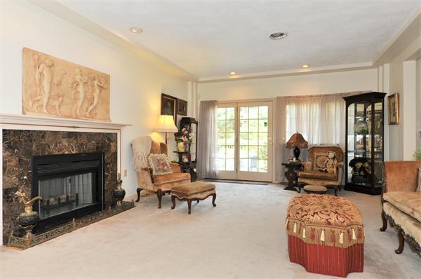 41 Forest Street Sherborn, MA 01770 - Photo 11 of 30 a living room with furniture and a fireplace