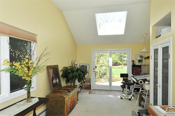 41 Forest Street Sherborn, MA 01770 - Photo 12 of 30 a view of a livingroom with furniture and a window
