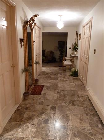 41 Forest Street Sherborn, MA 01770 - Photo 15 of 30 a view of a hallway with a couch
