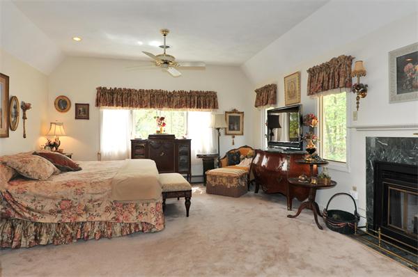 41 Forest Street Sherborn, MA 01770 - Photo 16 of 30 a bedroom with bed and a window