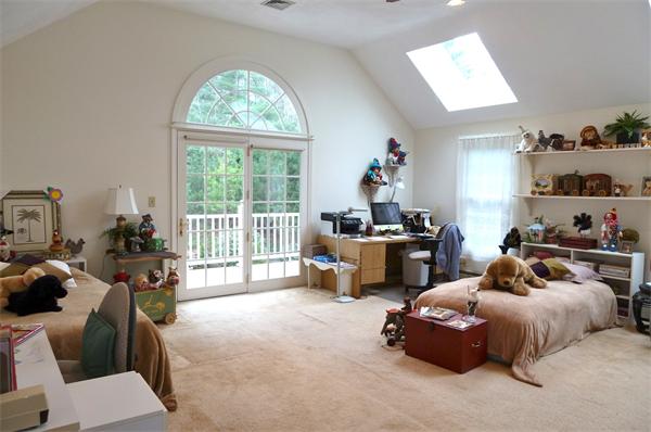 41 Forest Street Sherborn, MA 01770 - Photo 18 of 30 a bed room with two beds and a large window