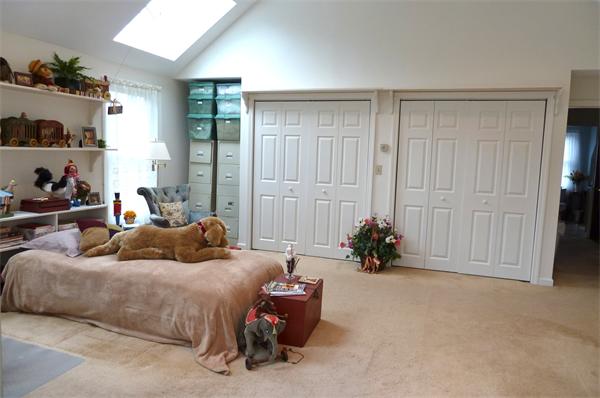 41 Forest Street Sherborn, MA 01770 - Photo 19 of 30 a living room with furniture and a chandelier