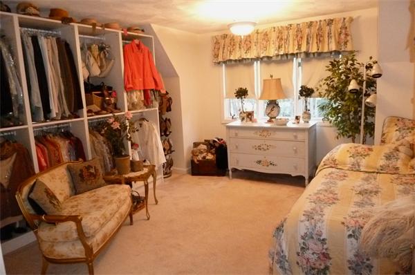 41 Forest Street Sherborn, MA 01770 - Photo 22 of 30 a bed room with a bed and a chair