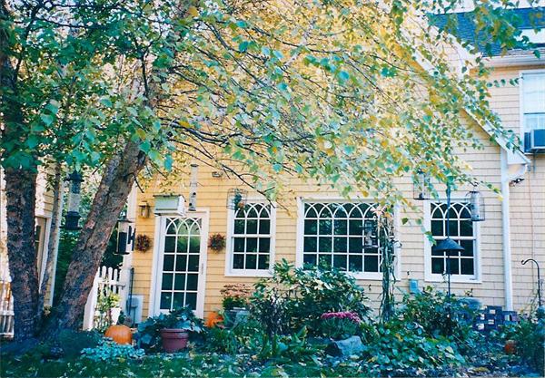 41 Forest Street Sherborn, MA 01770 - Photo 24 of 30 front view of a brick house with a yard