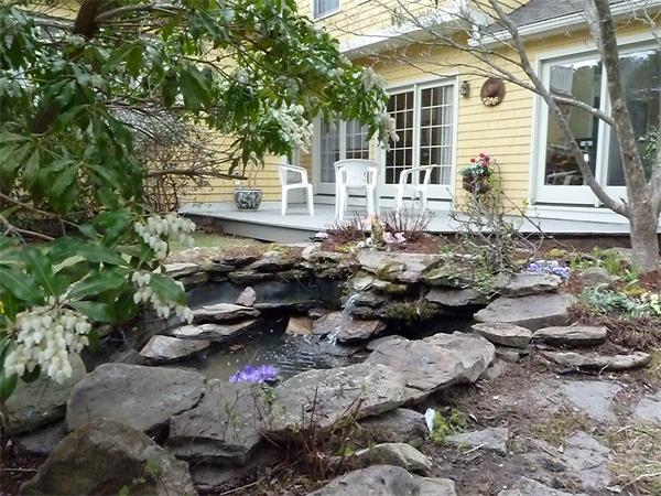 41 Forest Street Sherborn, MA 01770 - Photo 25 of 30 a view of a backyard with sitting area