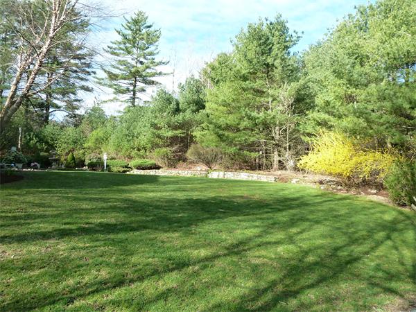 41 Forest Street Sherborn, MA 01770 - Photo 29 of 30 a view of grassy field with benches