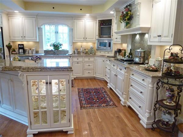 41 Forest Street Sherborn, MA 01770 - Photo 5 of 30 a kitchen with a stove a sink and a cabinets