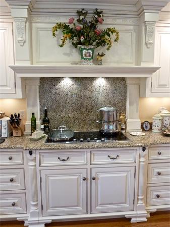 41 Forest Street Sherborn, MA 01770 - Photo 7 of 30 a kitchen with stainless steel appliances granite countertop a sink and cabinets