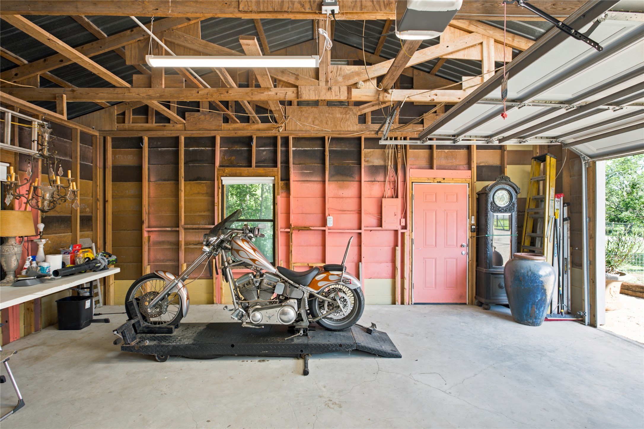 372 Old Lockhart Road Lockhart, TX 78644 - Photo 34 of 40 Ample space with concrete flooring for a workshop or vehicle storage.