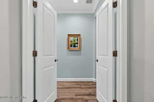 a bathroom with a shower and a sink