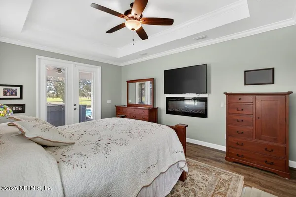 a view of a living room and a floor to ceiling window
