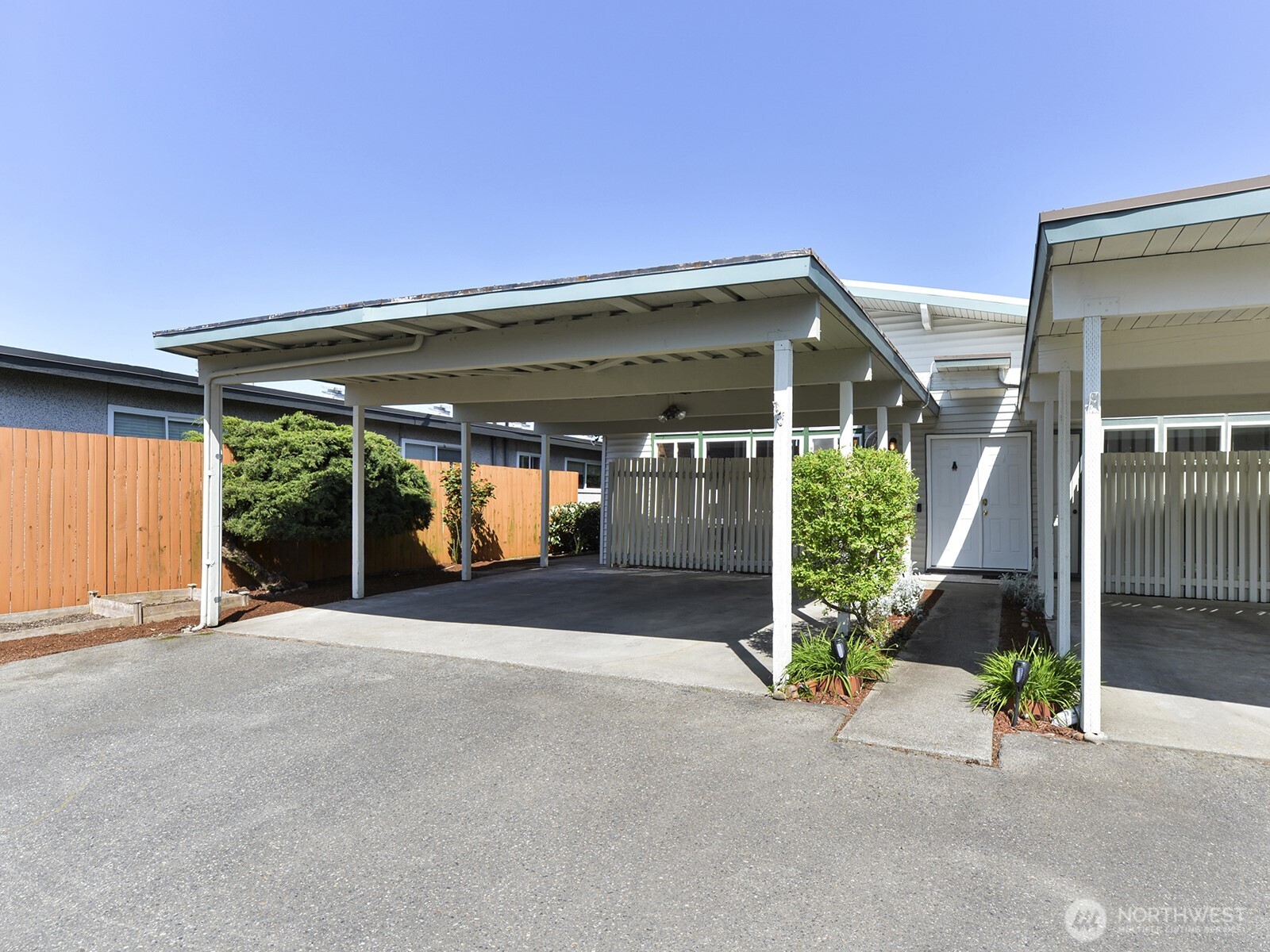 2814 Northeast 8th Street, Unit A Renton, WA 98056 - Photo 1 of 1 a view of a house with porch and garden