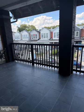 a view of a balcony with an outdoor space