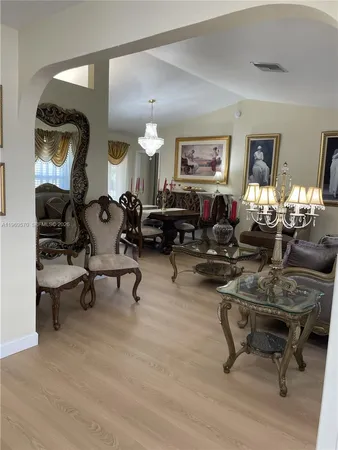 a living room with furniture and a window